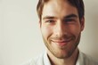 © Stocknterias - Portrait of a handsome young man with beard looking at camera.