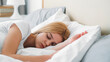 © golubovy - Bed rest. Morning nap. Lazy day. Young peaceful girl enjoying sleeping dreaming relaxing on soft pillow in comfortable bright room.