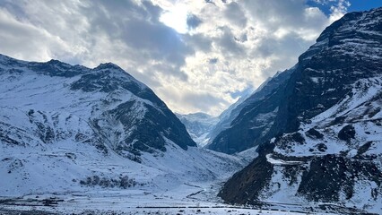 Panoramic view of Snow Mountains with blue skies.Alps and Blue Sky around Titlis mountain.Himalayan mountain ranges