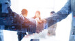 © metamorworks - Business people shaking hands and digital technology concept. Digital transformation.
