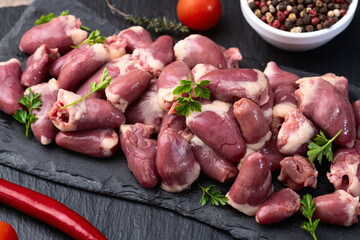 Poster - Raw chicken giblets hearts , meat background