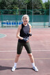 © dark_blade - young female boxer training in the stadium