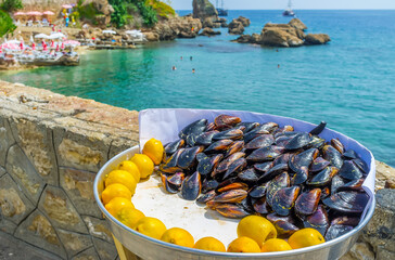 Canvas Print - The stuffed mussels with aromatic rice and lemon on Antalya coast, Turkey