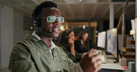 Poster - Black man, call center and consulting with computer at night for customer service or support at office. Young African, consultant or agent talking and working late for online advice at workplace