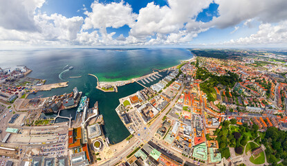 Wall Mural - Helsingborg, Sweden. Panorama of the city in summer with port infrastructure. Oresund Strait. Aerial view