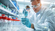 © Mongkol - High-tech lab researchers analyze clinical trial results in advanced research setting.