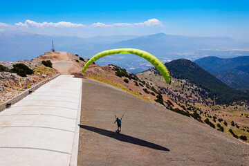 Sticker - Flying paraglider at Babadag mountain in Turkey