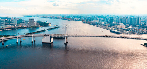 Wall Mural - Aerial view of the Rainbow Bridge in Odaiba, Tokyo, Japan