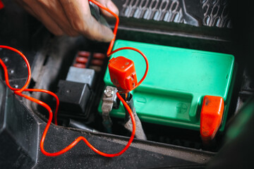 battery terminals on the motorbike, in open state