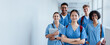 © Jacob Lund - Diversity in medicine: Young medical students wearing scrubs in a hospital