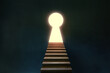 © GVS - Stairs to glowing entrance keyhole shape in dark room