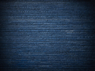 A monochromatic navy blue brick wall offering a sleek and refined look, perfect for creating a minimalistic backdrop.