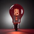 © Aaron - Close up isolated red lightbulb with copy space background, representing a good idea