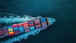 © visual artstock - Aerial view of a container ship sailing on the ocean.
