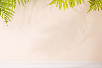 Poster - Template with empty table and wall with leaves shadow