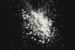 © Fotograf - A photograph of a large pile of powder in black and white