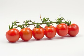 A collection of tomatoes arranged on a white surface, useful for food-related contexts