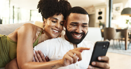 Sticker - Couple, phone and couch with social media, streaming and smile together in home with app. Online shopping, relax and happy people with technology and mobile video with web meme on the internet