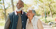 © HockleyM1/peopleimages.com - Love, laugh and senior couple in park for walk, exercise and fitness in retirement in nature or forest. Partner, diverse and support or trust for man and female person, care and hug or embrace