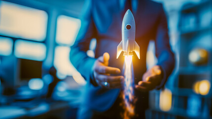 Canvas Print - Businessman launching a rocket in modern office