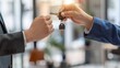 © decorator - Symbolic moment in real estate  key exchange signifying new beginnings and property ownership