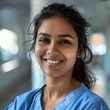 © Vorda Berge - Portrait of a smiling young nurse in the hospital