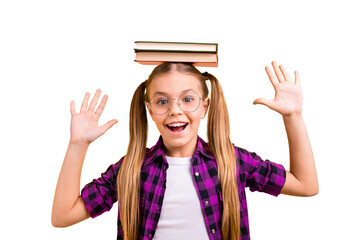 Wall Mural - Closeup photo of little lady pupil hold book on head laughing raise arms air wear specs checkered shirt isolated yellow background