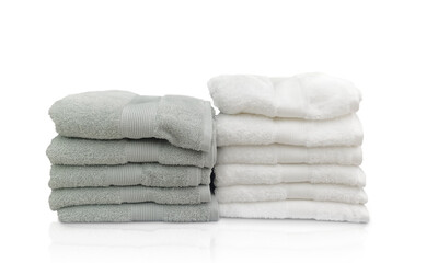 Two piles of folded towels Isolated on a white background