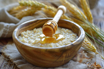 Wall Mural - A bowl of oatmeal with honey