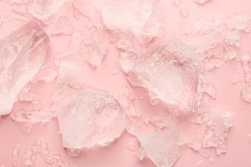 Wall Mural - Pieces of crushed ice on pink background, top view