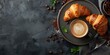 © Anastasiia - Aerial perspective of an innovative breakfast presentation featuring coffee and croissant. Concept Aerial Photography, Breakfast Presentation, Coffee, Croissant, Innovative Display