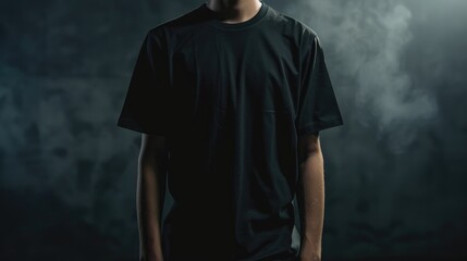 A man is wearing a black t-shirt with half sleeves, both on the front and back sides.