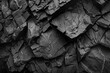 © btiger - Black gray rock stone texture background, volcanic basalt granite mountain cliff. Close-up macro 3d. Cracked broken fractured rocky material surface pattern