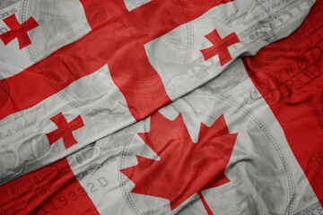 Poster - waving colorful flag of georgia and national flag of canada on the dollar money background. finance concept.