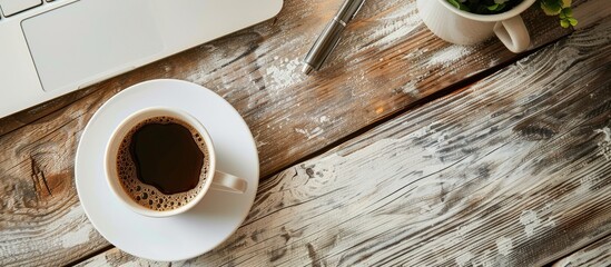Fototapete - Work desk with a cup of coffee and copy space image.