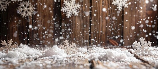 Poster - A wintry scene with white glitter snowflakes and snow on a wooden background, ideal for Christmas and New Year greeting cards, featuring a copy space image.