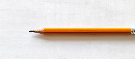 Poster - A pencil displayed on a white background with room for additional image or text.