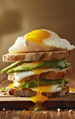 Wall Mural - avocado sandwich, crowned with a glistening poached egg