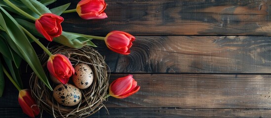 Leinwandbilder - Easter-themed greeting card with tulip bouquet, nest of eggs, on rustic wooden backdrop. Top view flat lay with copy space image for Easter concept, showcasing spring tulips.