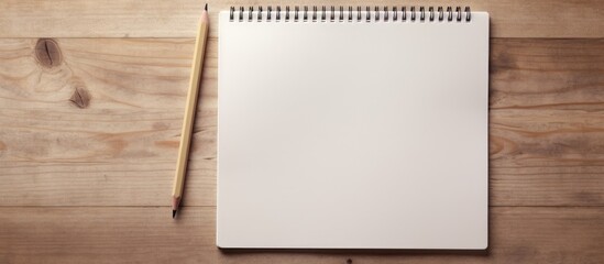 Canvas Print - A notepad and pencil resting on the floor with ample copy space image.