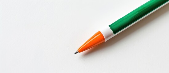 Poster - Isolated on a white background, an orange and green marker with copy space image.
