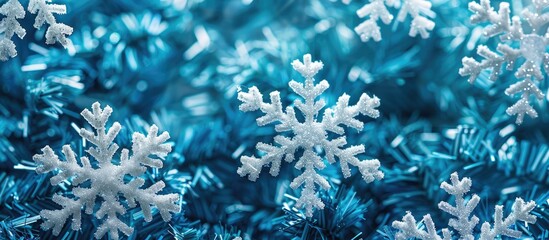 Aufkleber - A festive Christmas background featuring white snowflakes on blue, with a top view perspective and room for a copy space image, conveying holiday greetings for Merry Christmas and a Happy New Year.