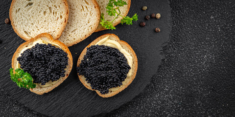 Wall Mural - lumpfish caviar seafood black caviar natural fresh appetizer meal food snack on the table copy space food background rustic top view