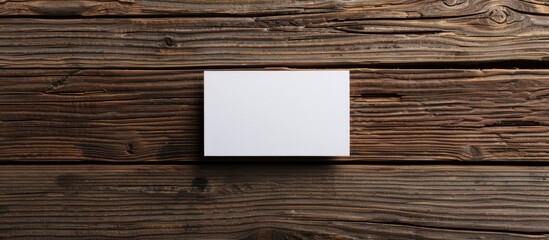 Aufkleber - Close-up shot of a white business card on a wooden backdrop with copy space image for corporate identity templates.