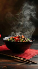 Poster - A black bowl filled with steaming vegetables and meat, ready to be enjoyed