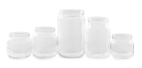 Wall Mural - Many empty glass jars isolated on white