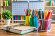 © Adisorn - Colorful pens, notebooks, and textbooks are neatly organized on a desk, with a calendar and lesson plans in the background, ready for a new school year.