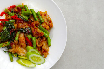 Wall Mural - Rice topped with stir fried pork and red curry paste with yard-long bean