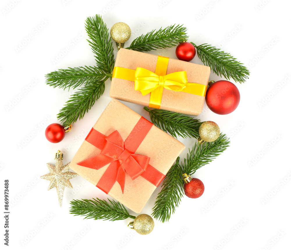 Gift boxes with fir branches and Christmas balls on white background