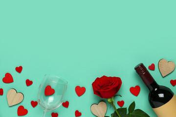 Wall Mural - Composition with bottle of wine, rose flower and glass for Valentine's day on turquoise background